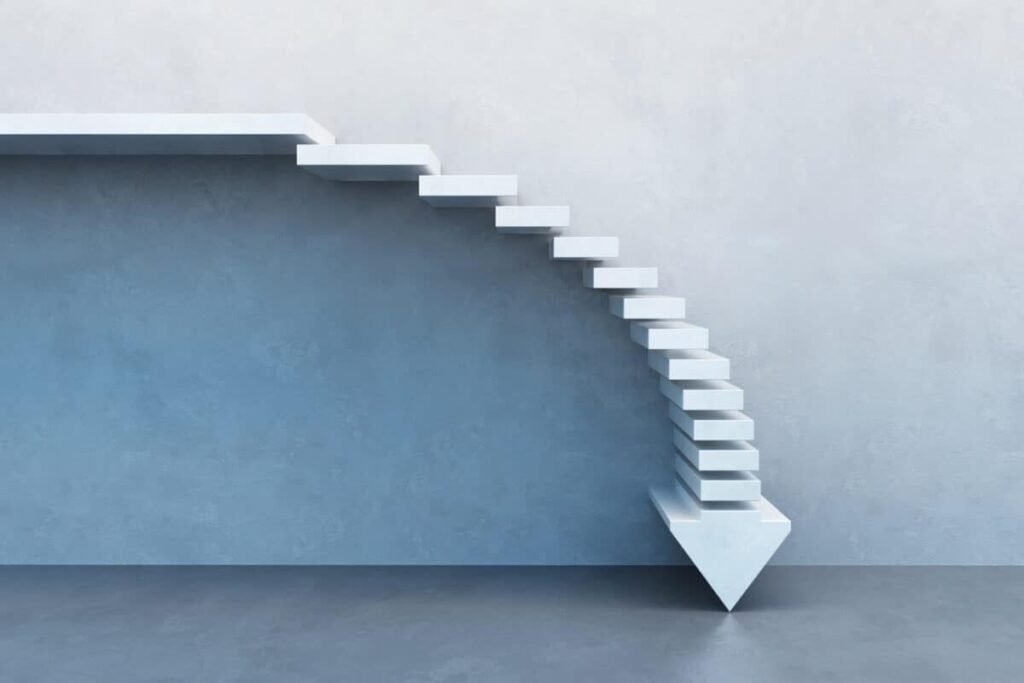 rewrite this title in other words: A Dividend Stock to Buy and Hold Through Market Volatility crisis concept, falling stairs