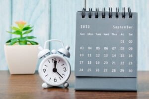 monthly calendar with clock