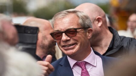 rewrite this title in other words: Nigel Farage Faces Fresh Scrutiny as Report Links Convicted Crypto Gambling Entrepreneur to Undisclosed Benefits Nigel Farage Faces Fresh Scrutiny as Report Links Convicted Crypto Gambling Entrepreneur to Undisclosed Benefits