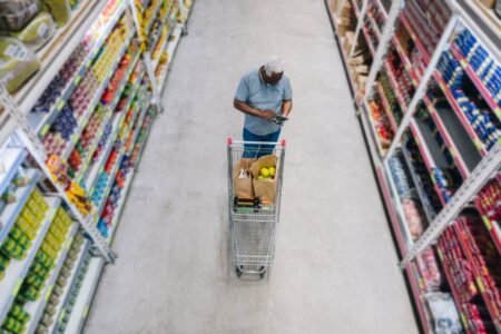 A High Dividend Yield May Signal Caution: Here’s the Reason Why man shops at grocery store