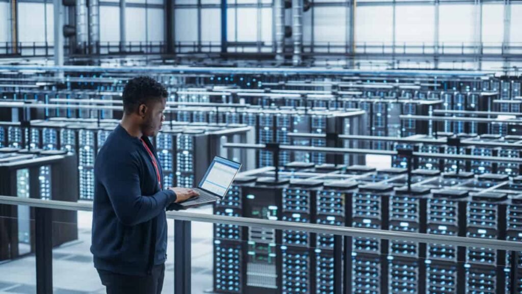 Hammond Power Solutions is Set for the Major Data Center Expansion: Here’s My Investment Strategy Data Center Engineer Using Laptop Computer crypto mining