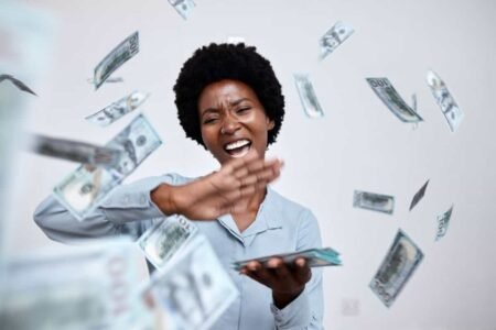 The Perfect TFSA Investment: A Steady Cash Flow with a 5.9% Yield happy woman throws cash